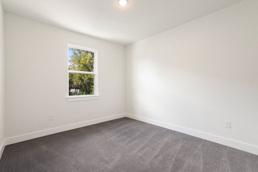 Spacious, unfurnished interior of a new home in Koenig Townhomes, Austin (Image 14).