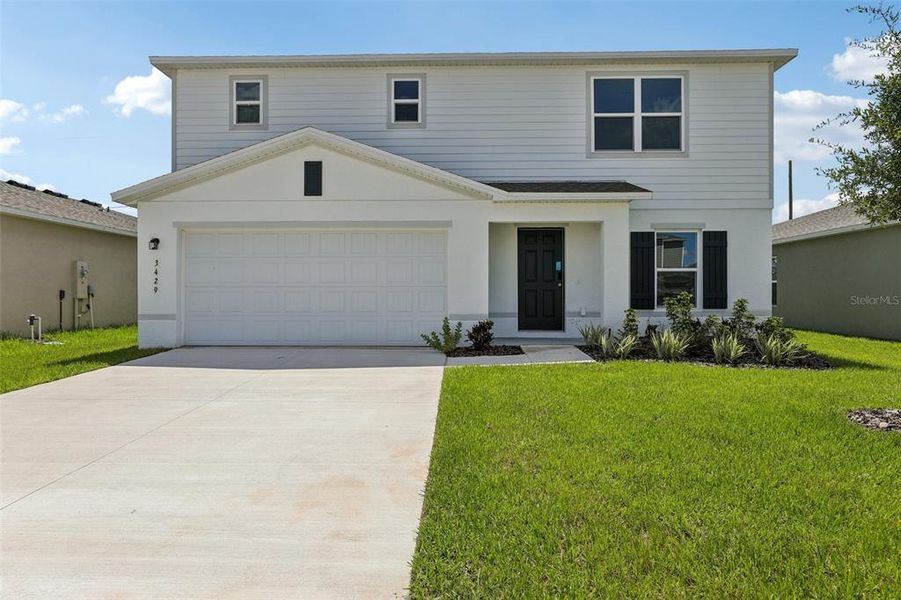 Front exterior of a new home in Sumter Villas, Sumterville, FL, highlighting curb appeal (Image 1). Front exterior of a new home in Sumter Villas, Sumterville, FL, highlighting curb appeal (Image 1).
