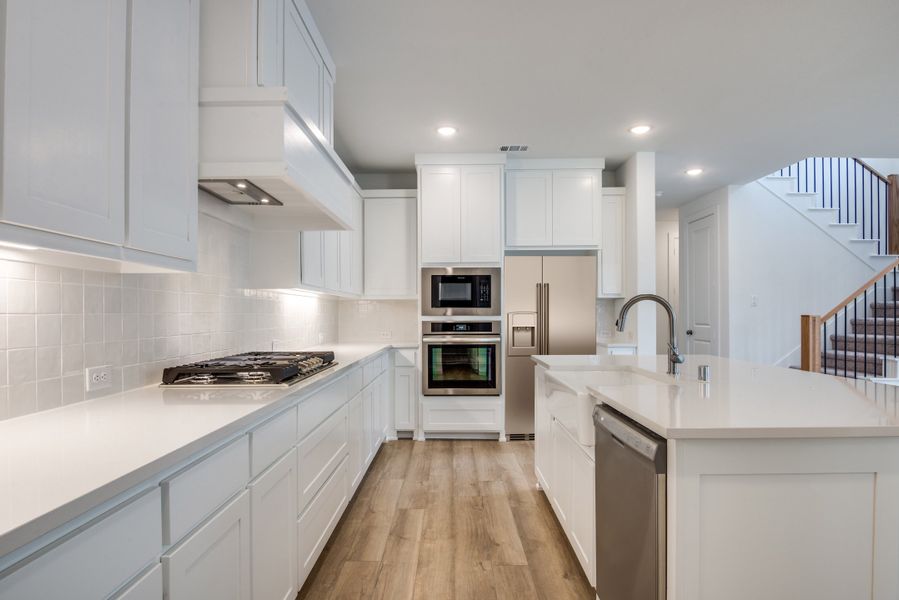 Furnished interior view inside a new home in Painted Tree - South, McKinney (Image 12).