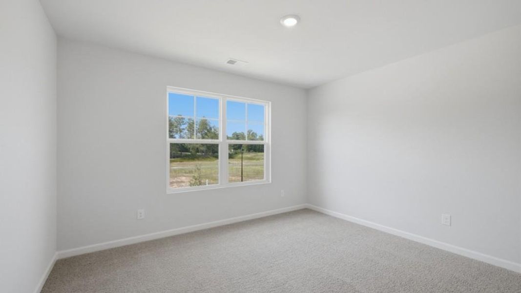 Spacious, unfurnished interior of a new home in Fairway 17 at Mirror Lake, Villa Rica (Image 27).