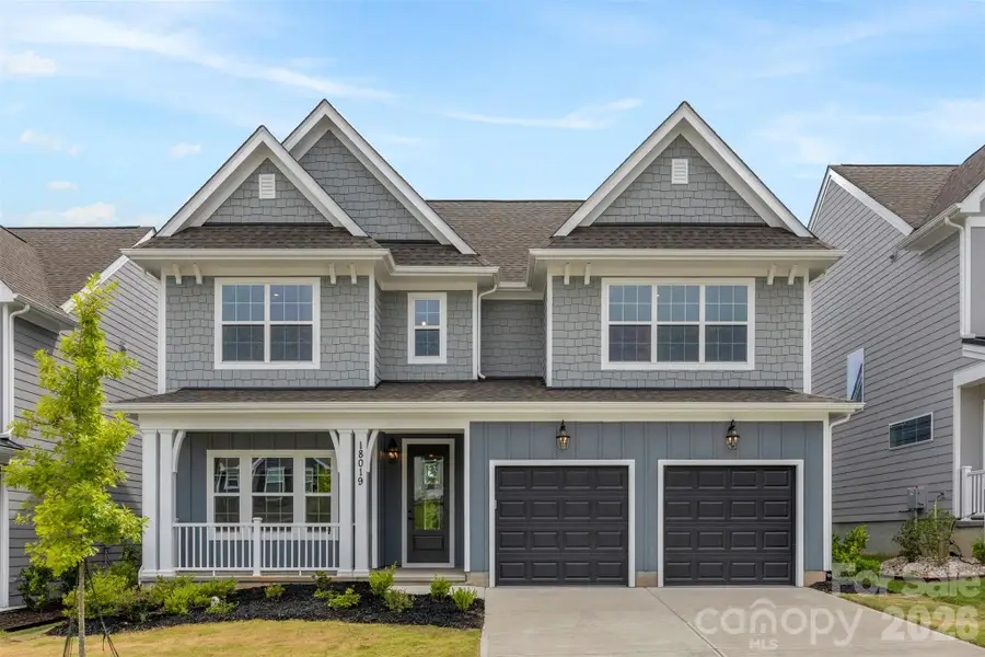 Front exterior of a new home in , Charlotte, NC, highlighting curb appeal (Image 1). Front exterior of a new home in , Charlotte, NC, highlighting curb appeal (Image 1).