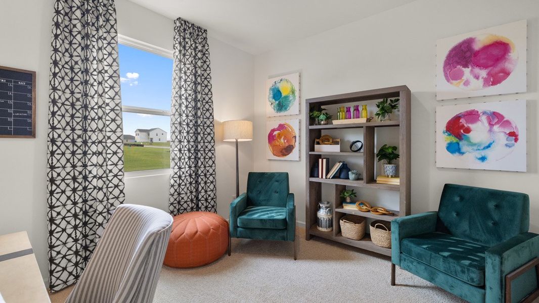 Representative furnished interior of a home built from the Cali by D.R. Horton in Champion's Run, Lithonia (Image 20).