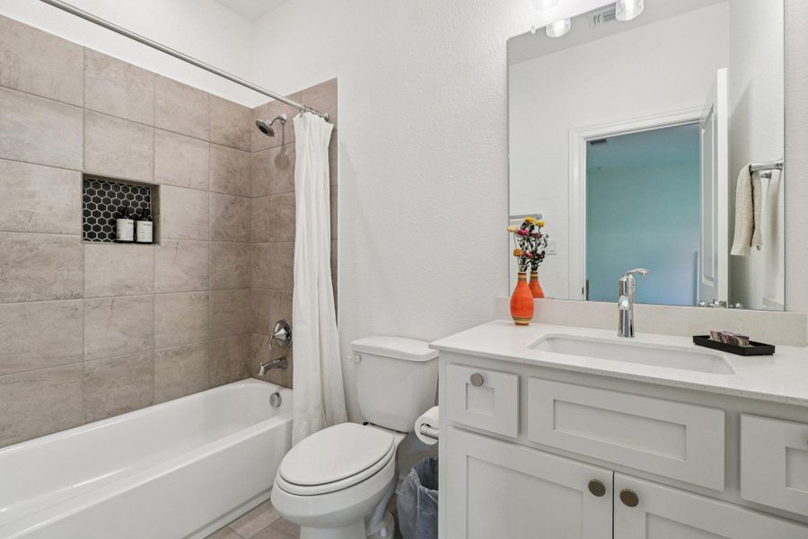 Furnished interior view inside a new home in Wolf Ranch West Bend - 70', Georgetown (Image 19).