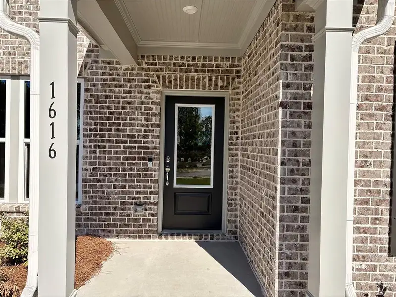 Exterior details and patio area of a home in Riversprings, Dacula (Image 4). Exterior details and patio area of a home in Riversprings, Dacula (Image 4).