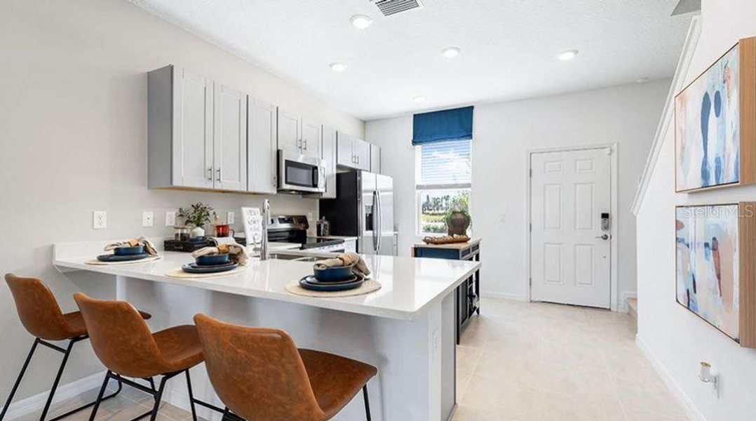 Furnished interior view inside a new home in The Townhomes at Azario Lakewood Ranch, Bradenton (Image 9). Furnished interior view inside a new home in The Townhomes at Azario Lakewood Ranch, Bradenton (Image 9).