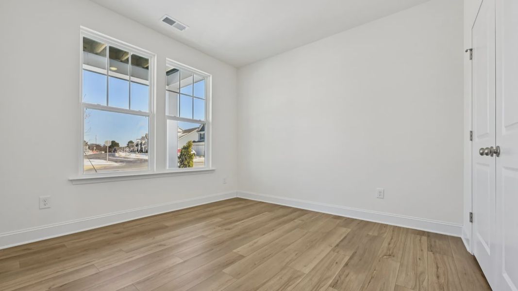 Furnished interior view inside a new home in Sidney Creek Single Family, Zebulon (Image 26).