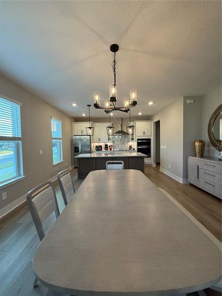 Furnished interior view inside a new home in Silverleaf Reserve Bungalows, Winter Garden (Image 5).