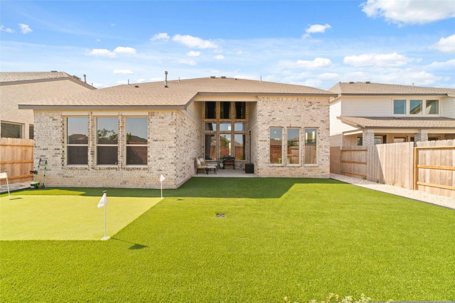 Exterior details and patio area of a home in Sunterra (Katy ISD), Katy (Image 2). Exterior details and patio area of a home in Sunterra (Katy ISD), Katy (Image 2).