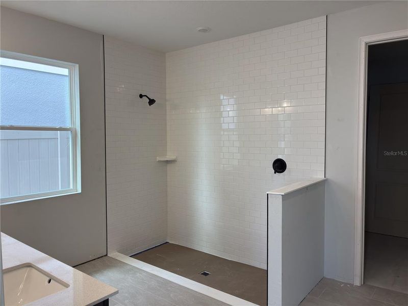 In-progress construction of a new home in Oakfield Trails, Parrish, FL (Image 8).