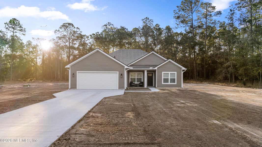 Front exterior of a new home in , Keystone Heights, FL, highlighting curb appeal (Image 2). Front exterior of a new home in , Keystone Heights, FL, highlighting curb appeal (Image 2).