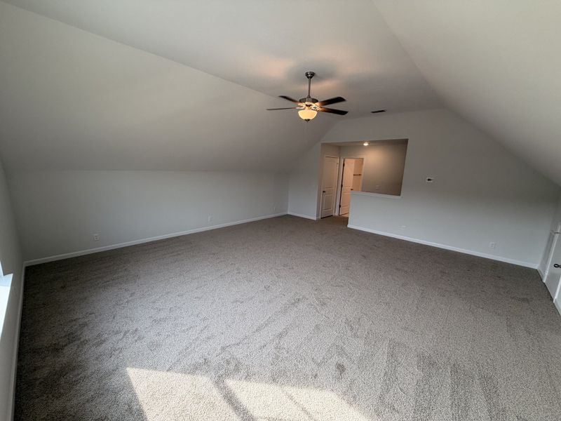 1/2 wall at the top really opens the space up! Upstairs also has it`s own Bathroom and walk in attic storage space!