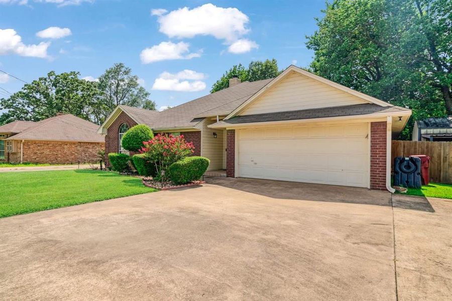 Front exterior of a new home in , Reno, TX, highlighting curb appeal (Image 16).