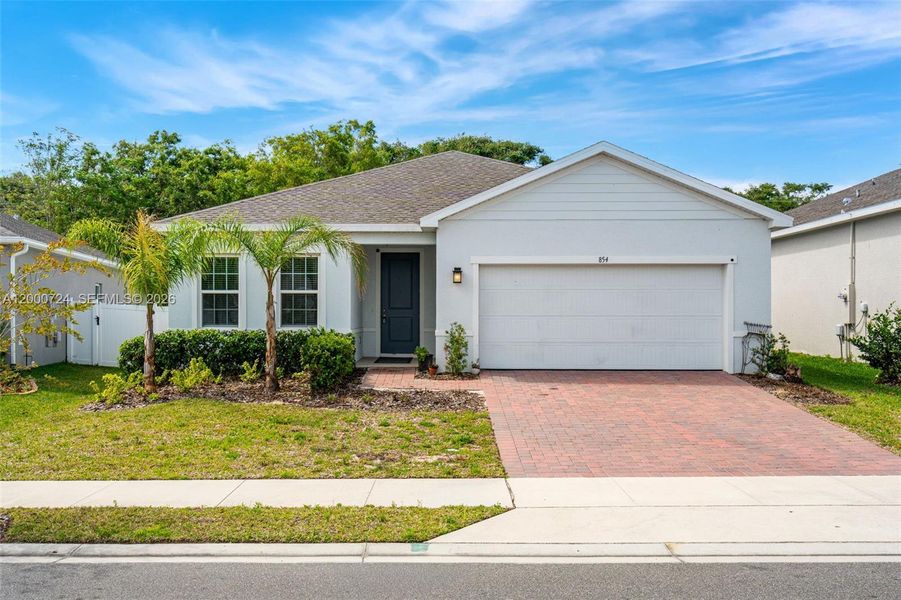 Front exterior of a new home in Brooks Landing, Titusville, FL, highlighting curb appeal (Image 2). Front exterior of a new home in Brooks Landing, Titusville, FL, highlighting curb appeal (Image 2).