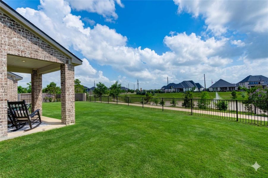 Exterior details and patio area of a home in Cross Creek West, Fulshear (Image 23).