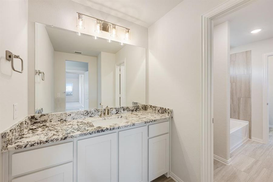 Furnished interior view inside a new home in Union Park Classic 55, Little Elm (Image 9). Furnished interior view inside a new home in Union Park Classic 55, Little Elm (Image 9).