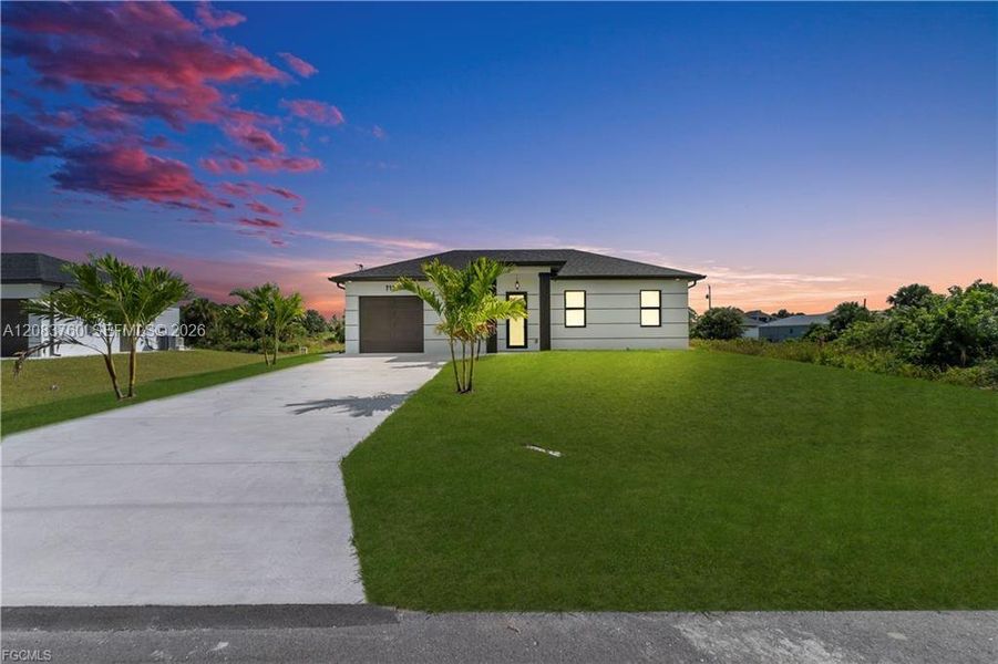 Front exterior of a new home in , Lehigh Acres, FL, highlighting curb appeal (Image 19).