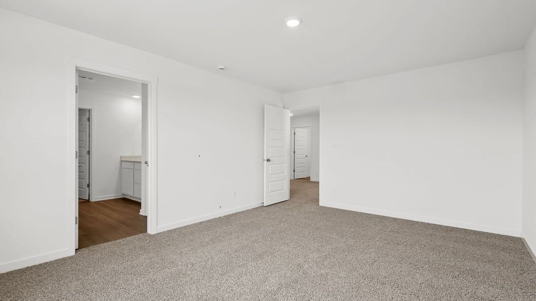 Representative unfurnished interior of a home built from the Holcombe by D.R. Horton in Peachtree Meadows, Rockwall (Image 44).