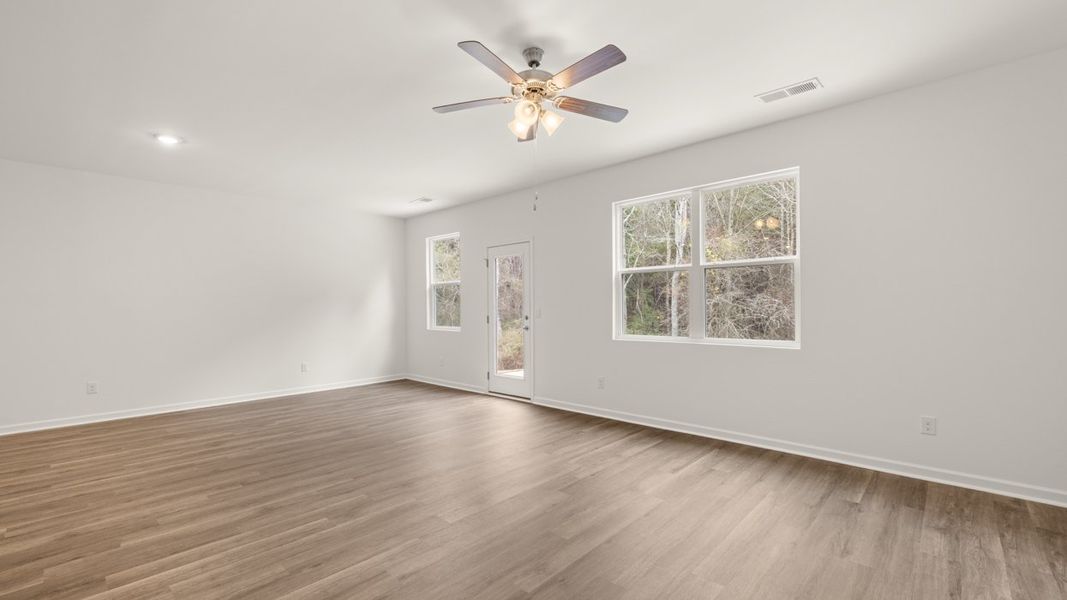 Representative unfurnished interior of a home built from the Cali by D.R. Horton in The Reserve at Calcutta, Stockbridge (Image 13).