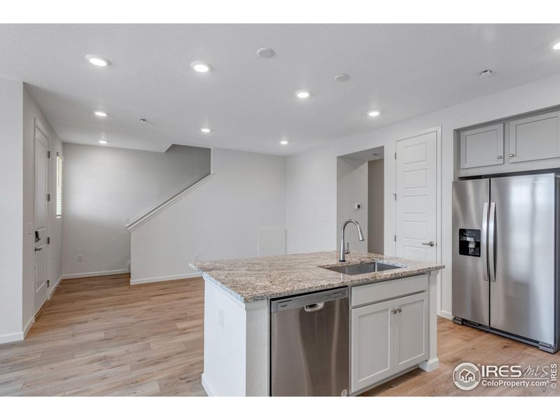 Furnished interior view inside a new home in Westside Crossing Townhomes, Berthoud (Image 5).
