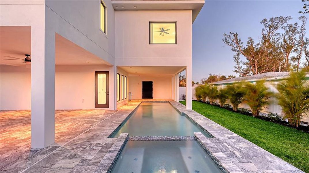 Exterior details and patio area of a home in , Englewood (Image 26).