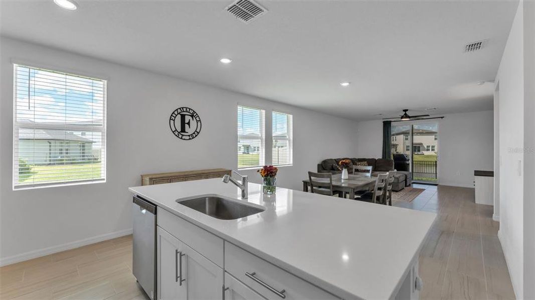 Furnished interior view inside a new home in The Grove at Stuart Crossing - Premier Series, Bartow (Image 8).
