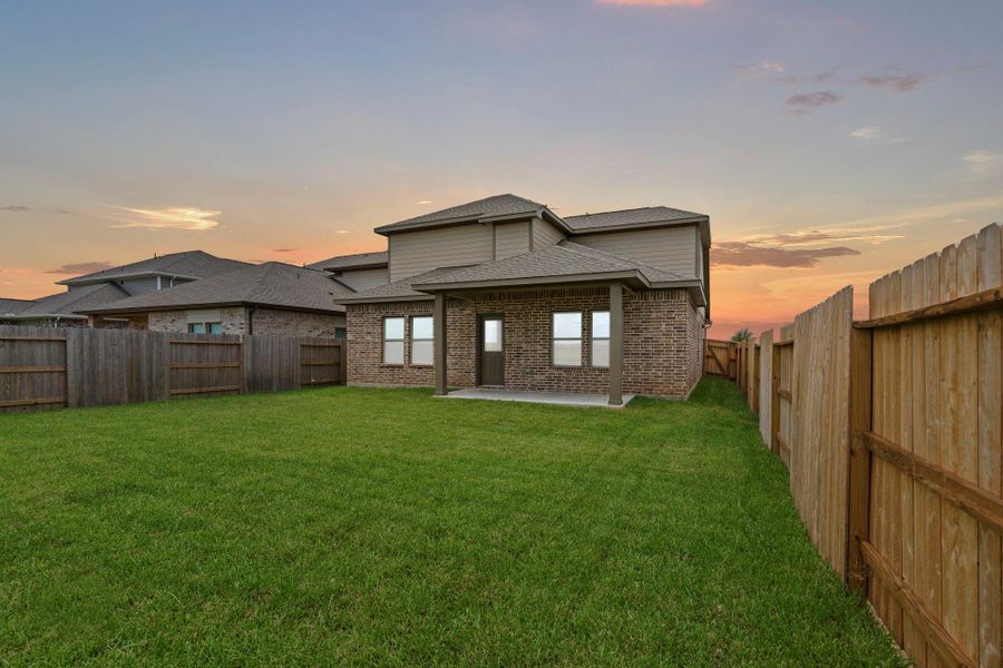 Exterior details and patio area of a home in Windrose Green, Angleton (Image 3). Exterior details and patio area of a home in Windrose Green, Angleton (Image 3).