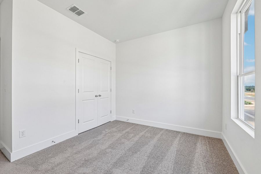 Spacious, unfurnished interior of a new home in Freedom at Anthem, Kyle (Image 16).