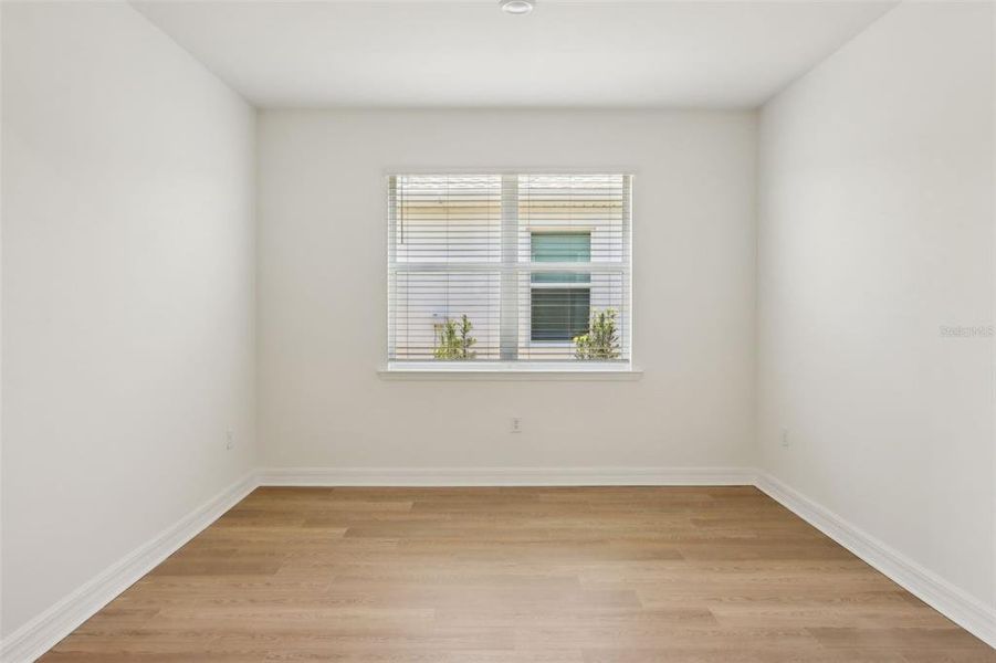 Spacious, unfurnished interior of a new home in Crescent Lakes - Signature Series, Punta Gorda (Image 8).