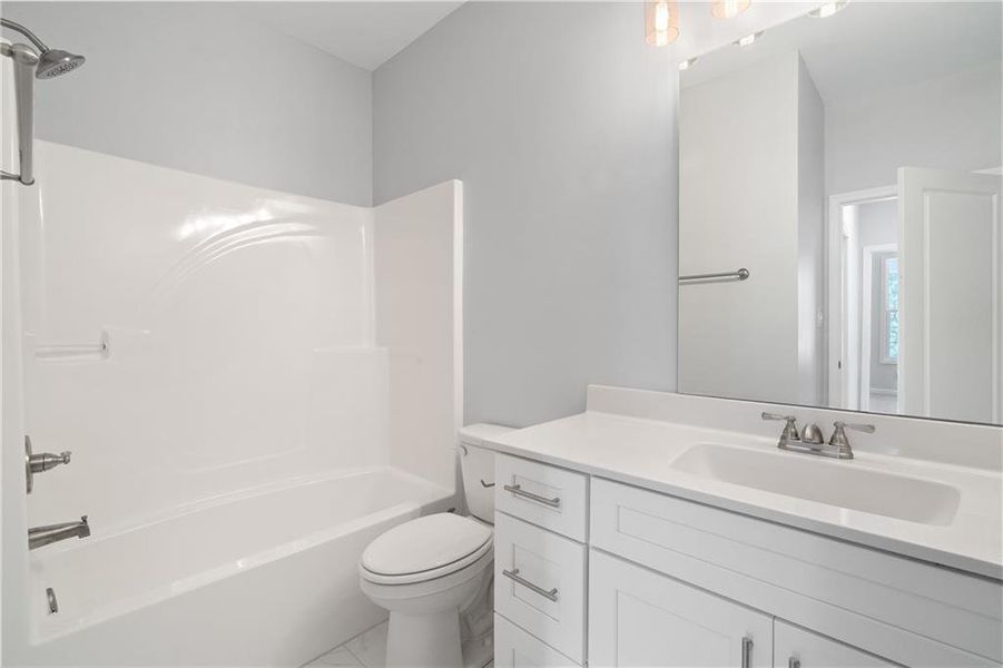 Furnished interior view inside a new home in , Gray (Image 6).