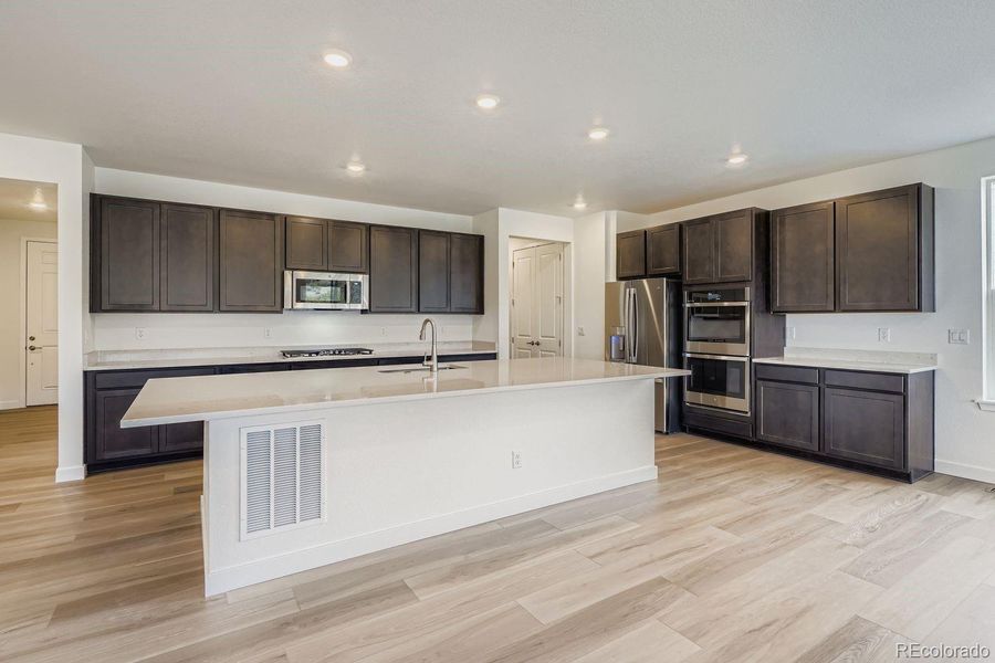 Furnished interior view inside a new home in Macanta: The Grand Collection, Castle Rock (Image 8).