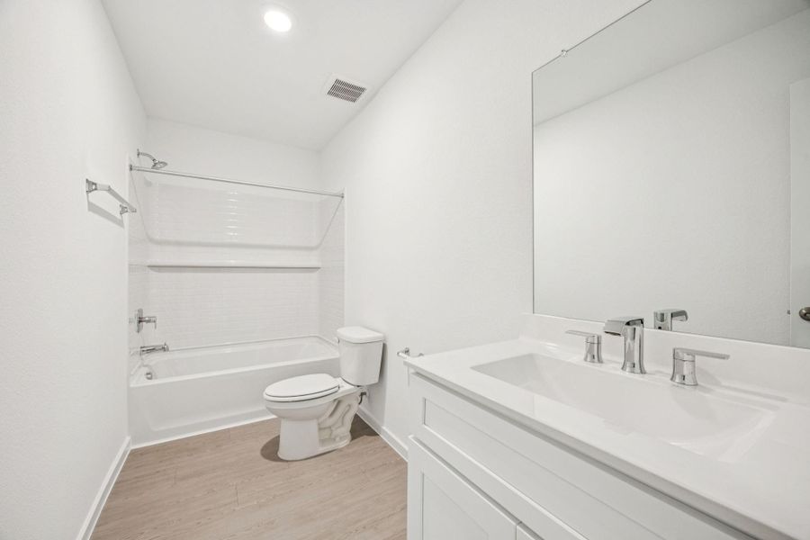 Furnished interior view inside a new home in Decker Farms, Magnolia (Image 9).