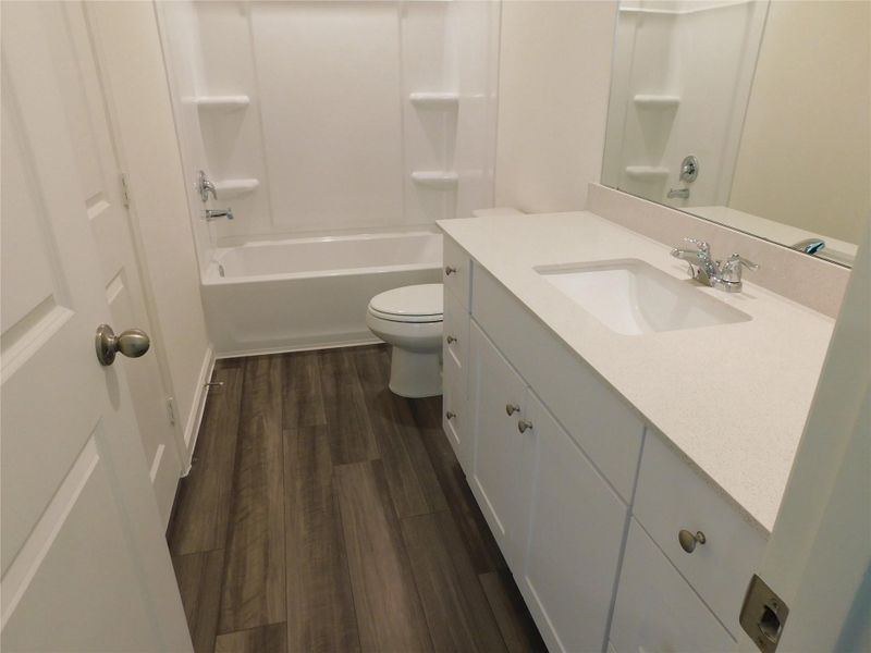 Furnished interior view inside a new home in Royal Pines, Porter (Image 9).