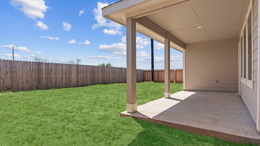 Exterior details and patio area of a home in Tamarron, Fulshear (Image 2). Exterior details and patio area of a home in Tamarron, Fulshear (Image 2).