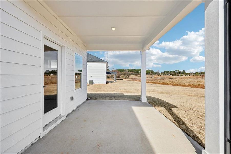 Exterior details and patio area of a home in River Pointe, Monroe (Image 3).