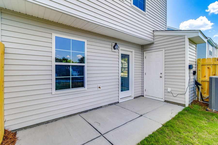 Exterior details and patio area of a home in Padgett Commons, Hopkins (Image 3).