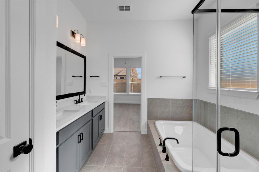 Furnished interior view inside a new home in Prairieland Village - Grove Collection, Cypress (Image 8).