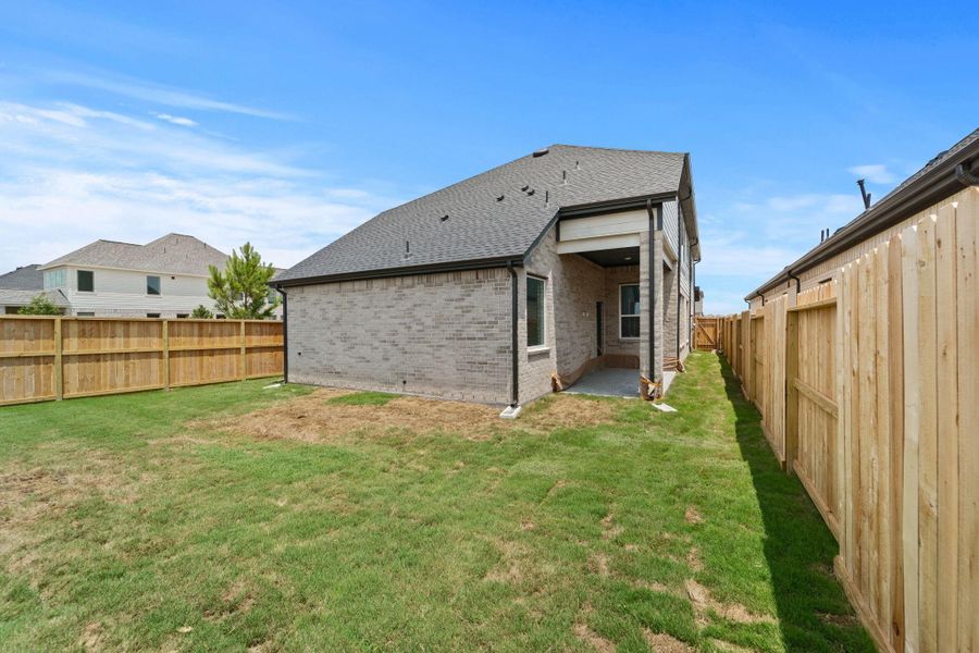 Front exterior of a new home in Jordan Ranch, Fulshear, TX, highlighting curb appeal (Image 22). Front exterior of a new home in Jordan Ranch, Fulshear, TX, highlighting curb appeal (Image 22).