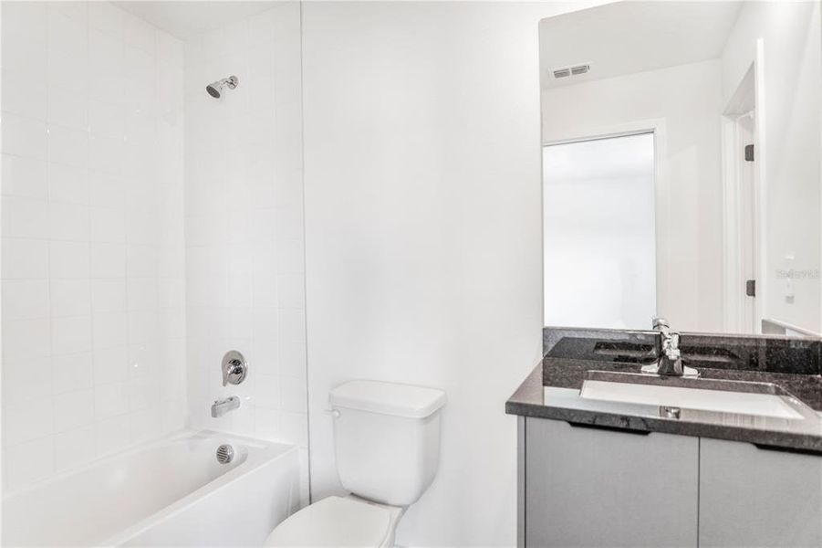 Furnished interior view inside a new home in , Kissimmee (Image 5).