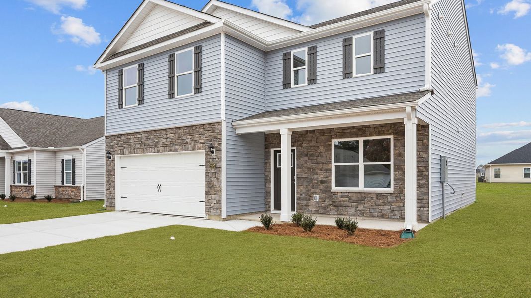 Front exterior of a new home in Villa Grande, Winterville, NC, highlighting curb appeal (Image 18).
