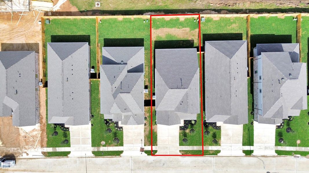 This home sits on a large lot with ample yard space in front and the back, lush landscaping and a well-maintained yard.