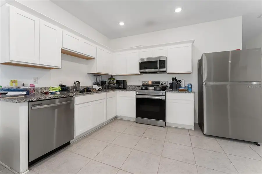 Furnished interior view inside a new home in Ashford Place, St. Cloud (Image 3).