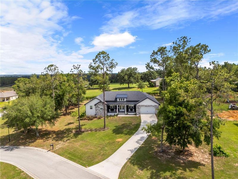 Front exterior of a new home in , Dade City, FL, highlighting curb appeal (Image 21).