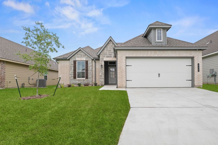 Front exterior of a new home in Hartrick Ranch, Temple, TX, highlighting curb appeal (Image 2). Front exterior of a new home in Hartrick Ranch, Temple, TX, highlighting curb appeal (Image 2).