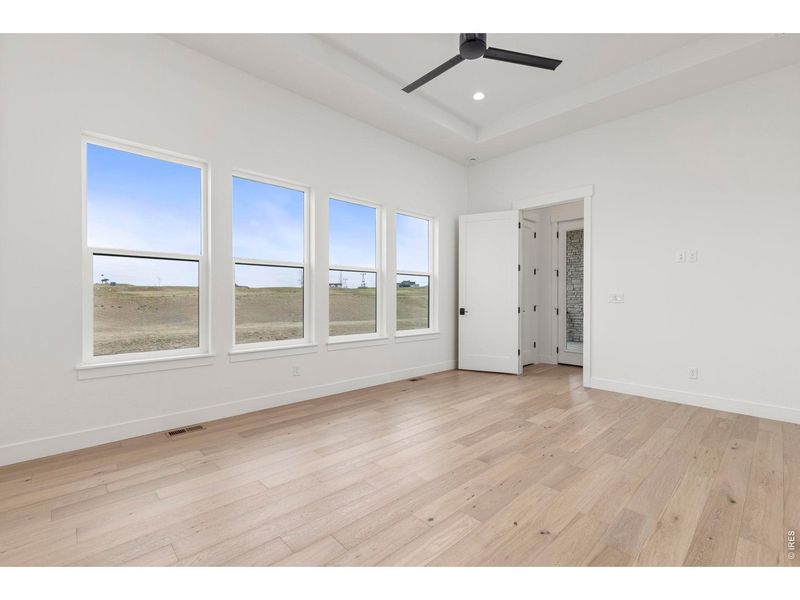Spacious, unfurnished interior of a new home in RainDance, Windsor (Image 40).