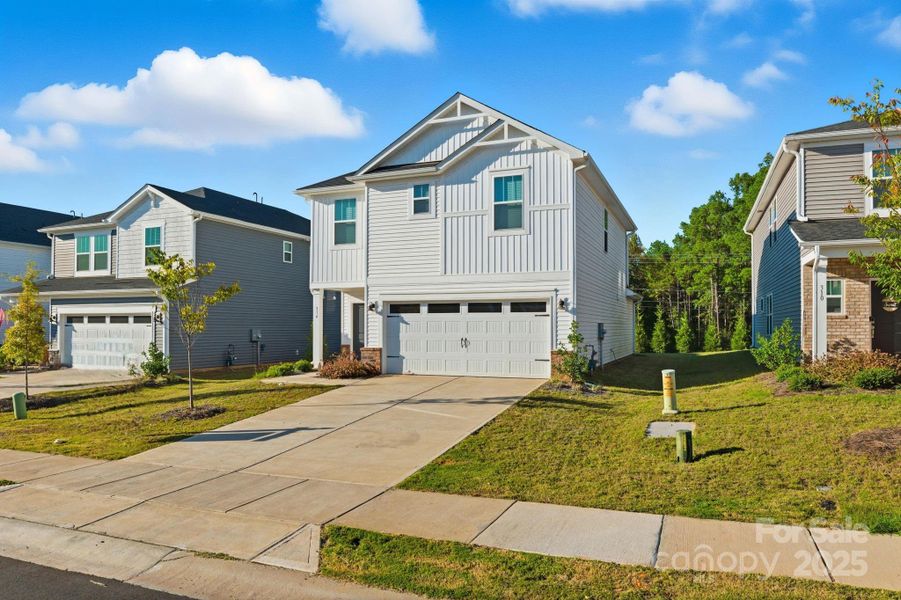 Front exterior of a new home in , York, SC, highlighting curb appeal (Image 1). Front exterior of a new home in , York, SC, highlighting curb appeal (Image 1).