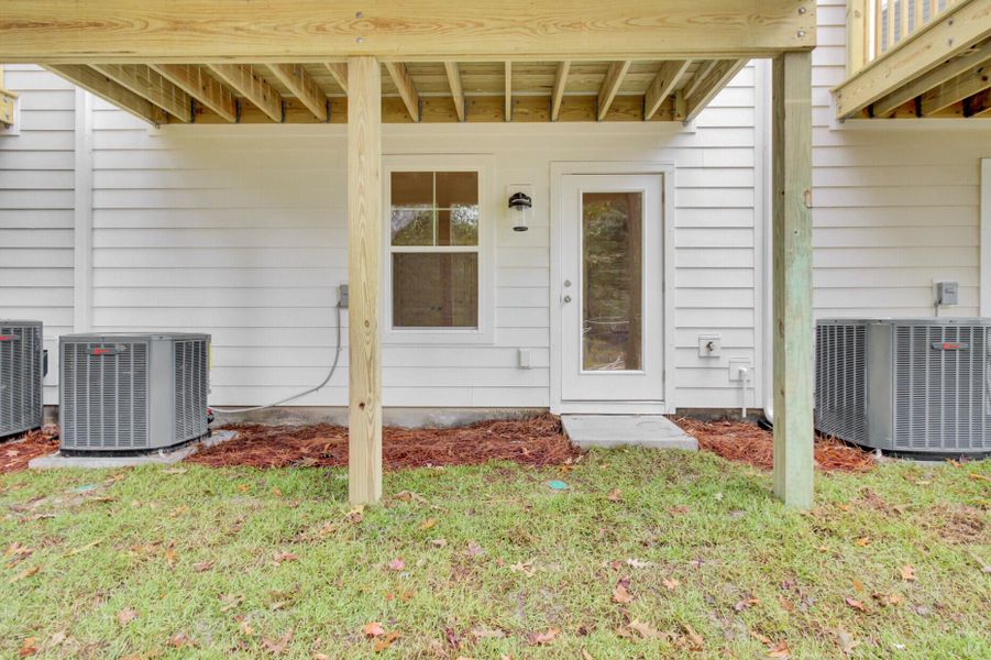 Exterior details and patio area of a home in Indigo Grove Townhomes, Johns Island (Image 25).