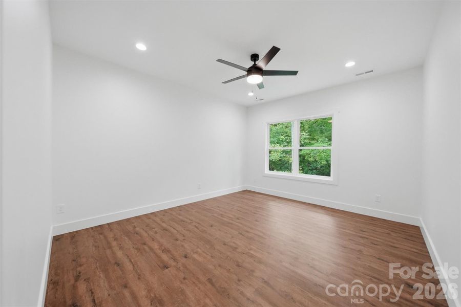 Spacious, unfurnished interior of a new home in , Lenoir (Image 36).