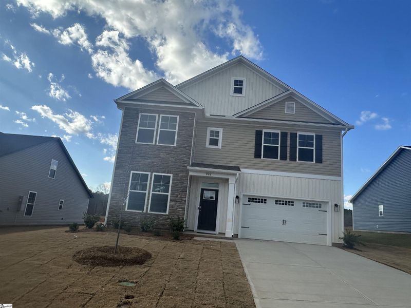 Front exterior of a new home in Shiloh Trail, Wellford, SC, highlighting curb appeal (Image 21).