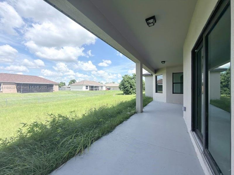 Exterior details and patio area of a home in , Lehigh Acres (Image 4). Exterior details and patio area of a home in , Lehigh Acres (Image 4).