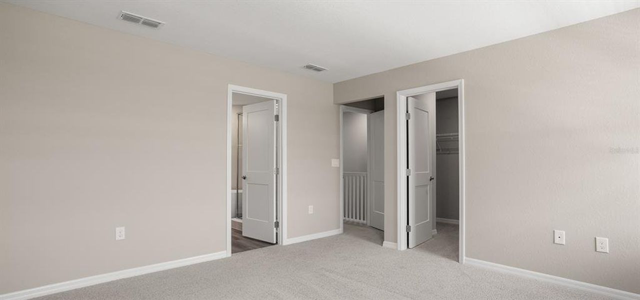 Spacious, unfurnished interior of a new home in Estates at Hickory Cove - Bungalows, St. Cloud (Image 13).